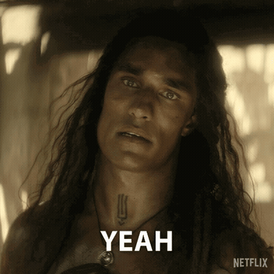 A Man With Long Hair And A Tattoo On His Neck Says " Yeah " GIF