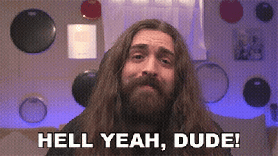 A Man With Long Hair And Beard Says Hell Yeah Dude GIF