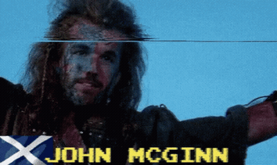 A Man With Long Hair And The Name John Mcginn On His Face GIF