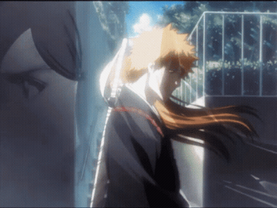 A Man With Long Hair Is Holding A Sword In His Hand GIF