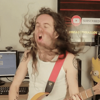 A Man With Long Hair Is Playing A Guitar In Front Of A Subscribe Button GIF