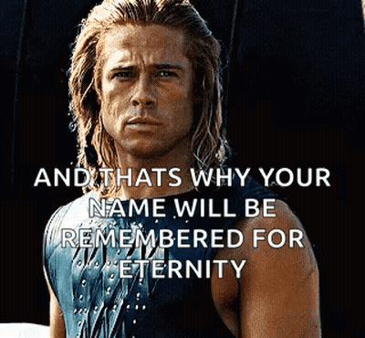 A Man With Long Hair Is Standing In Front Of A Black Background With A Quote . GIF