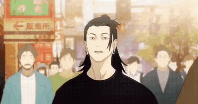 A Man With Long Hair Is Standing In Front Of A Crowd Of People In A City . GIF