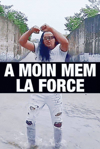 A Man With Long Hair Is Standing In The Water With The Words A Moin Mem La Force GIF