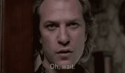 A Man With Long Hair Is Talking To A Woman And Asking Her If She Is A Great , Big , Fat Person . GIF