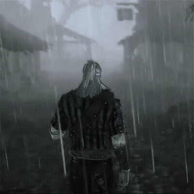 A Man With Long Hair Is Walking Through The Rain GIF