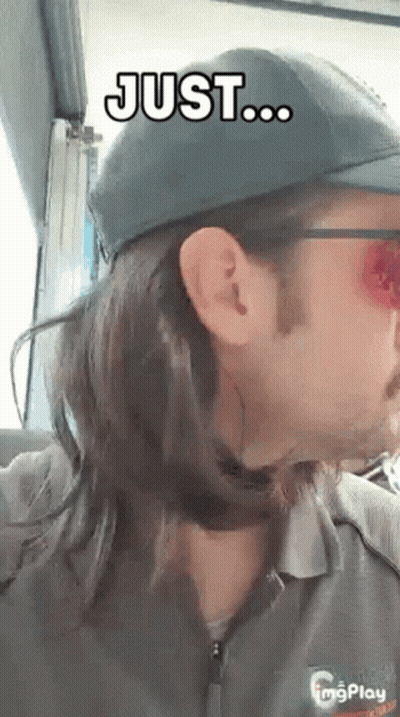 A Man With Long Hair Is Wearing A Hat And Sunglasses And Says Just ... GIF