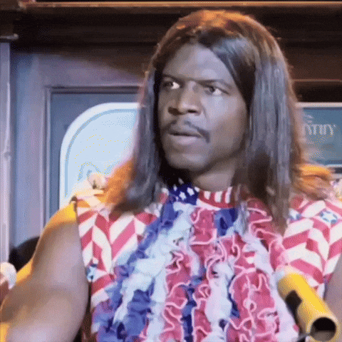 A Man With Long Hair Is Wearing A Red White And Blue Shirt And A Lei . GIF