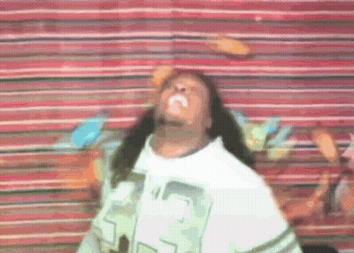 A Man With Long Hair Is Wearing A White Shirt With The Number 23 On The Front GIF