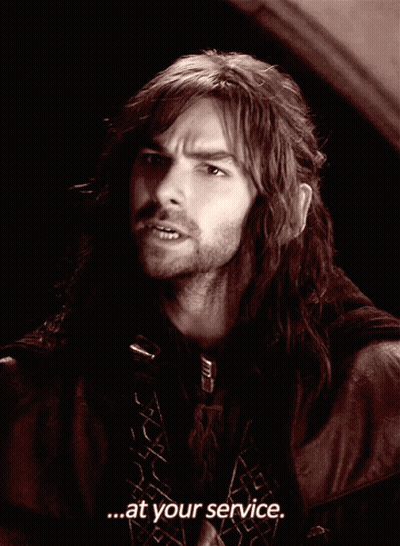 A Man With Long Hair Says " At Your Service " GIF