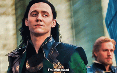 A Man With Long Hair Says I 'M Impressed While Another Man Looks On GIF