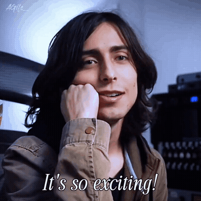 A Man With Long Hair Says " It 'S So Exciting ! " GIF