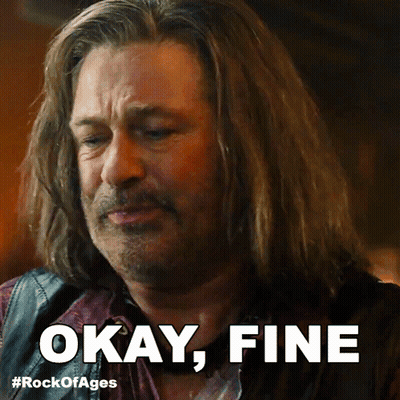 A Man With Long Hair Says " Okay Fine " In Front Of Him GIF