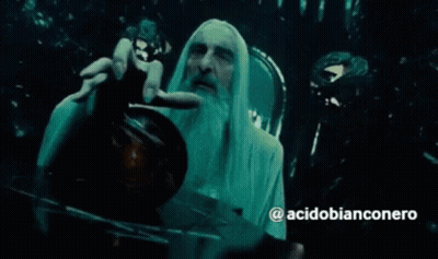 A Man With Long White Hair And A Beard Is Holding Something In His Hand With The Hashtag Acidobianconero On The Bottom GIF