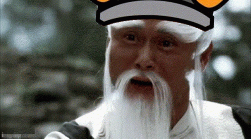 A Man With Long White Hair And A Beard Is Wearing A Hat . GIF