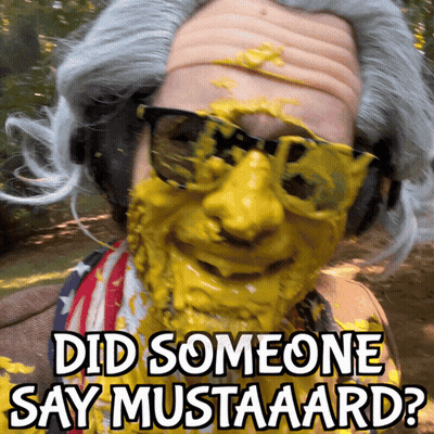A Man With Mustard On His Face Is Wearing Sunglasses GIF