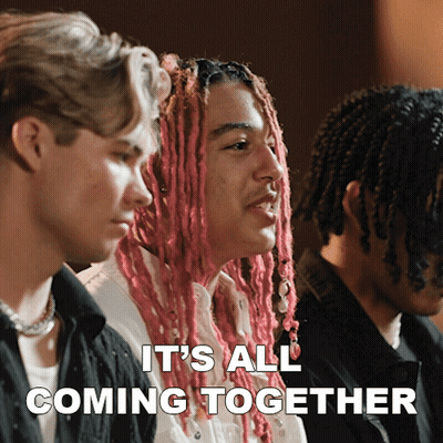 A Man With Pink Dreadlocks Has The Words It 'S All Coming Together On The Bottom GIF