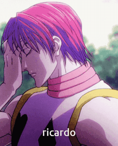 A Man With Pink Hair Has The Name Ricardo On The Bottom GIF