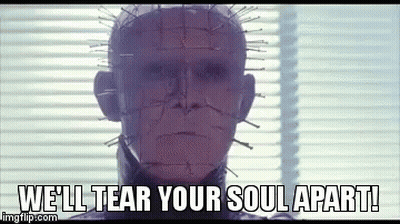 A Man With Pins In His Head Is Standing In Front Of A Window With Blinds . GIF