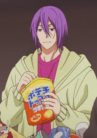 A Man With Purple Hair Is Holding A Bag Of Chips With Chinese Writing On It GIF