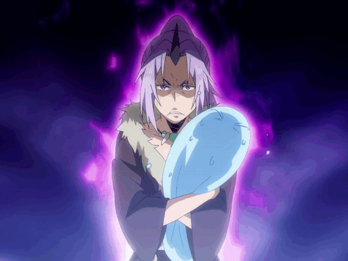 A Man With Purple Hair Is Holding A Blue Object In His Hands GIF