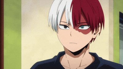 A Man With Red And White Hair And Blue Eyes GIF