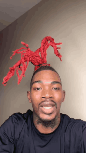 Man With Red Dreadlocks Smiling GIF