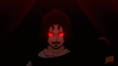 A Man With Red Eyes And A Beard Looks Angry GIF