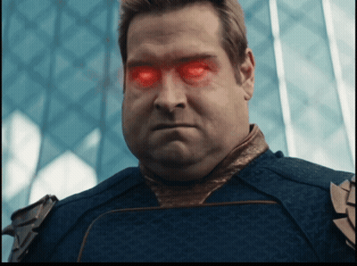 A Man With Red Eyes And A Blue Shirt GIF