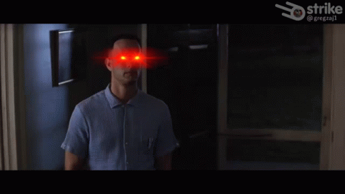 A Man With Red Eyes And The Words " I 'M Not A Smart Man " GIF