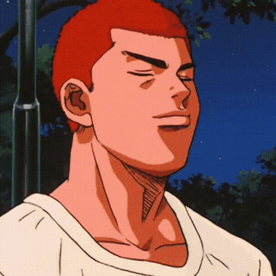 A Man With Red Hair And A White Shirt Is Smiling GIF