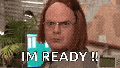 A Man With Red Hair And Glasses Is Standing In Front Of A Computer And Says `` I 'M Ready ! '' GIF