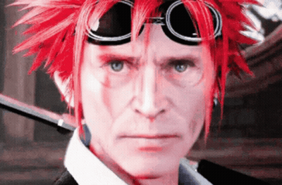 A Man With Red Hair And Goggles Looks At The Camera . GIF