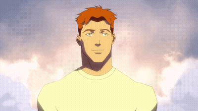A Man With Red Hair And Green Eyes Is Wearing A Yellow Shirt GIF