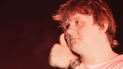 A Man With Red Hair Giving A Thumbs Up Sign GIF