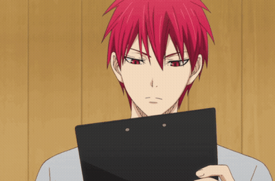 A Man With Red Hair Holds A Clipboard In His Hand GIF