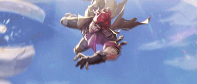 A Man With Red Hair Is Flying Through A Blue Sky GIF