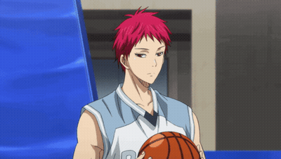 A Man With Red Hair Is Holding A Basketball With The Letter R On His Jersey GIF