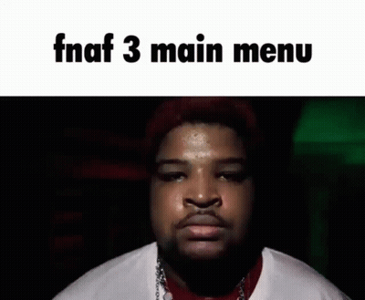 A Man With Red Hair Is Making A Funny Face In A Dark Room With The Words Fnaf 3 Main Menu Above Him . GIF