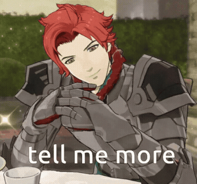 A Man With Red Hair Is Sitting At A Table With The Words Tell Me More GIF