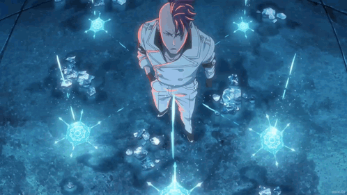 A Man With Red Hair Is Standing In A Room With A Blue Background GIF