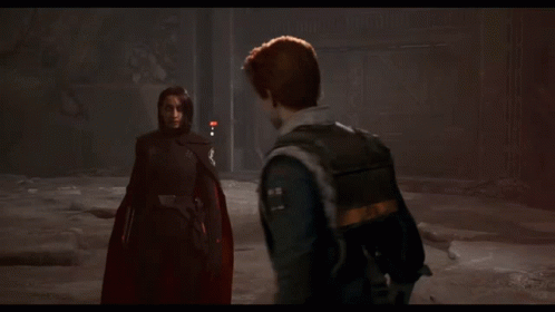 A Man With Red Hair Is Standing Next To A Woman GIF