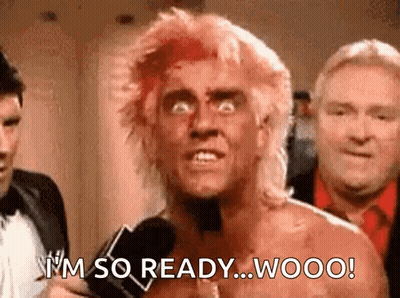 A Man With Red Hair Is Talking Into A Microphone And Saying `` I 'M So Ready ... Woo ! '' . GIF