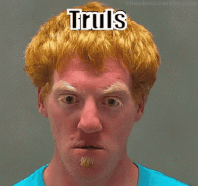 A Man With Red Hair Is Wearing A Blue Shirt And Has The Word Truls On His Head GIF