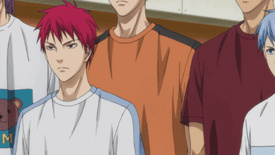 A Man With Red Hair Is Wearing A White Shirt With The Letter M On It GIF