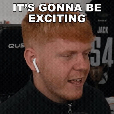 A Man With Red Hair Is Wearing Ear Buds And Says It 'S Gonna Be Exciting Above His Head GIF