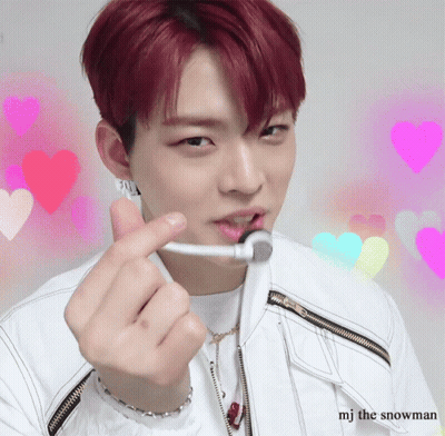 A Man With Red Hair Making A Heart Shape With His Fingers GIF