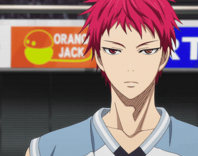 A Man With Red Hair Stands In Front Of A Sign That Says Orange Jack GIF