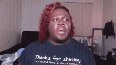 A Man With Red Hair Wearing A Shirt That Says Thanks For Sharing GIF
