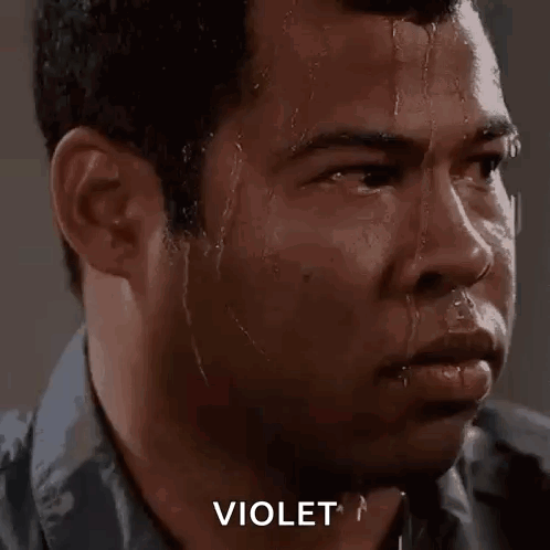 A Man With Sweat Coming Out Of His Face And The Word Violet On His Face . GIF